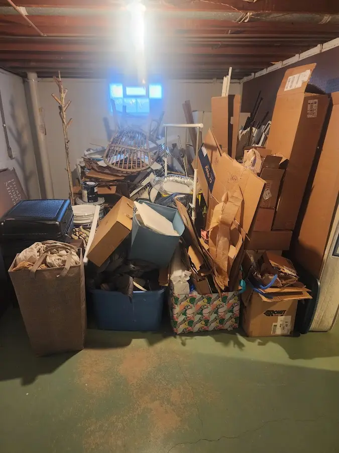 Roll-off dumpster container at job site for 2 Yard Dumpster Rental in Cottrellville